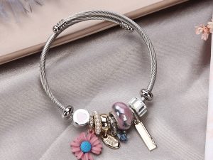 Chic Bohemian Charm Bracelet with Floral and Vintage Bead Accents