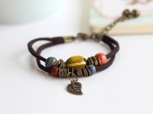 Vintage-Inspired Bohemian Charm Bracelet with Multi-Colored Beads and Leaf Pendant