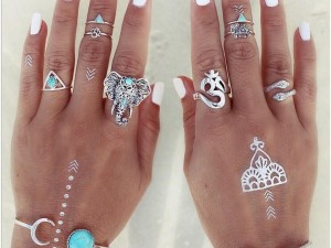 Eclectic Bohemian Silver Ring Collection with Geometric and Nature-Inspired Designs