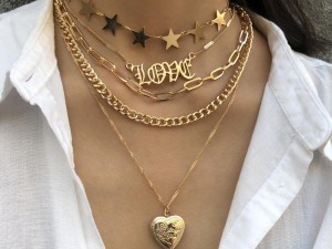 Layered Gold Charm Necklaces Set with Stars, 'Love' Script, and Heart Pendant