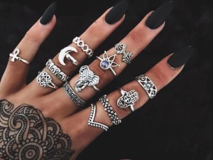 Bohemian Style Silver Ring Set with Black Stone Accents and Intricate Metalwork