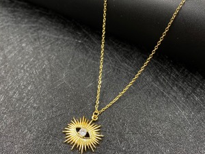 Gold-Tone Sunburst Pendant Necklace with Central Gemstone